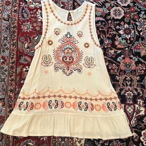 Gently worn Taylor & Sage embroidered tank with metal stud detail. Dillards